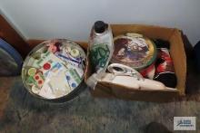 assorted sewing items and decorative tin