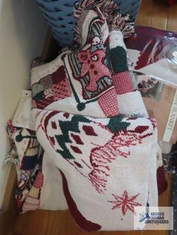 Assorted throw blankets and heart basket