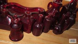 Ruby ashtray and assorted miniature bottles