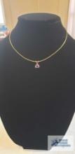 Gold colored necklace, marked 14KT Italy with purple stone pendant, marked 14K RGE, total