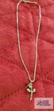 Silver rose pendant, marked Sterling on silver colored necklace, marked B. David Sterling,