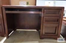 Cherry finish desk, matches lots 18, 19, and 21