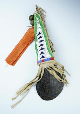 Buffalo-Horn Spoon with deer-hide grip cover and French silk ribbon strip. Beaded drop, 9 1/2".
