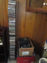 CD Rack with Two Boxes of CDs and Cassettes
