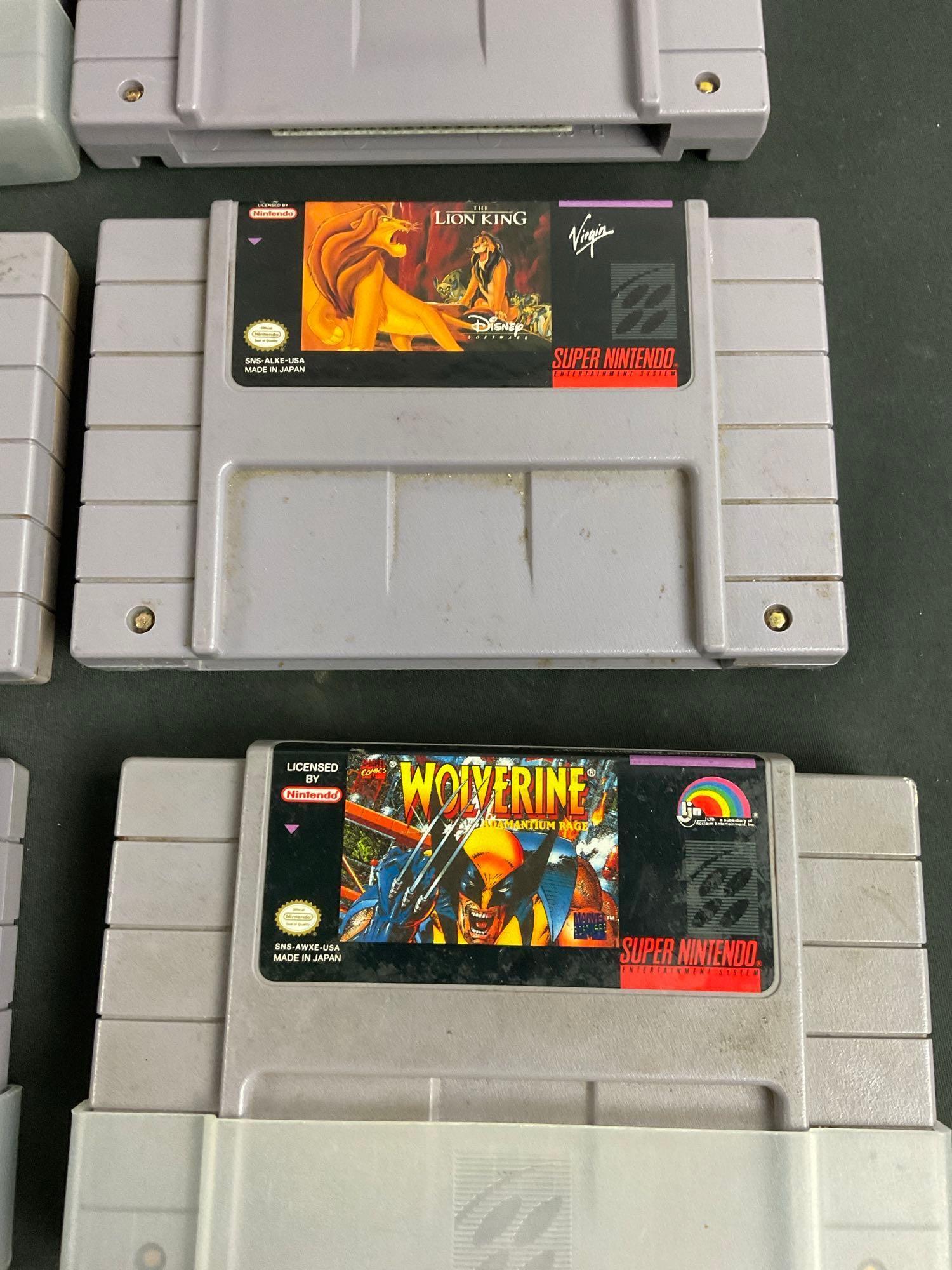 Collection of 16 SNES Game Cartridges incl. Several Star Wars, Starfox, Mario, & Marvel Titles