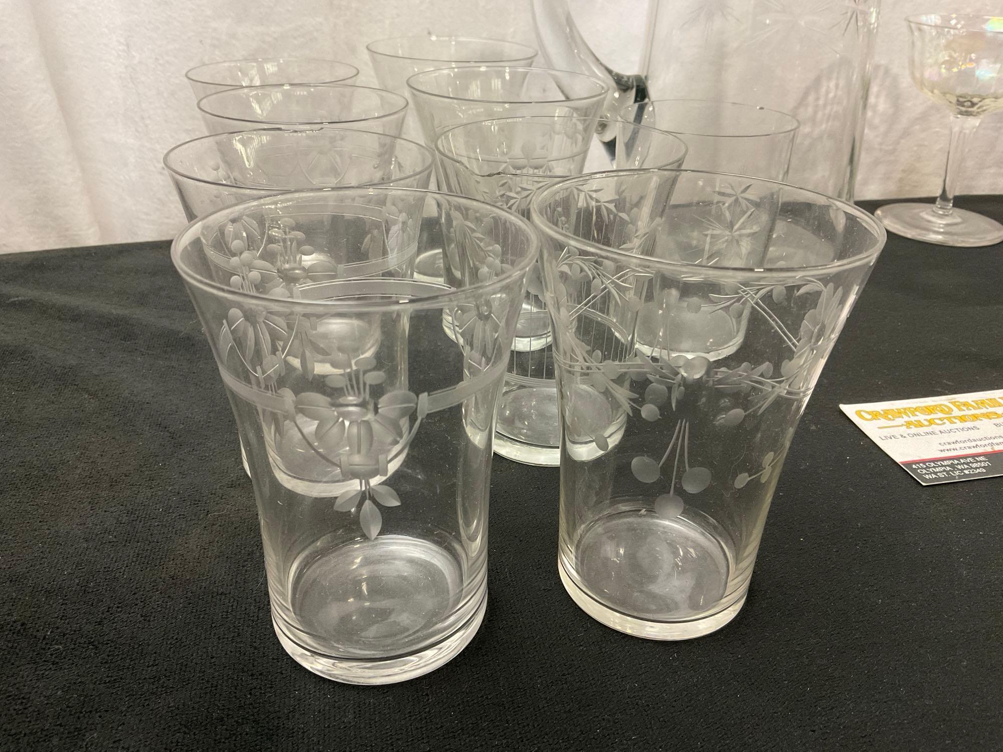 Collection of Etched & Iridescent Tumblers, and Coupe Glasses, and a Starburst Etched Pitcher