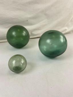 3 pcs Antique Japanese Green Glass Fish Net Floats. Largest Measures 4.5" Around. See pics.