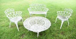 Lot #353 - White 4pc cast iron garden set to include: settee, two chairs and table