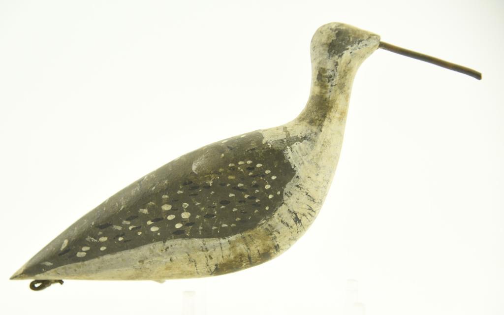Lot #329 - New England Mass. Plover decoy with leather rigging/carry strap on rear, cast iron
