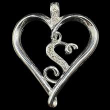 Estate sterling silver diamond pendant