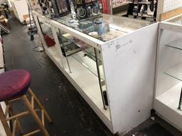 GLASS DISPLAY: 94" LENGTH X 19.5" DEEP (TOP GLASS CRACKED) (DOES NOT INCLUDE PRODUCTS)