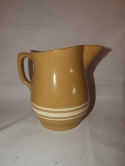 Gold-n-bake Wattware multi stripe Delaware pitcher