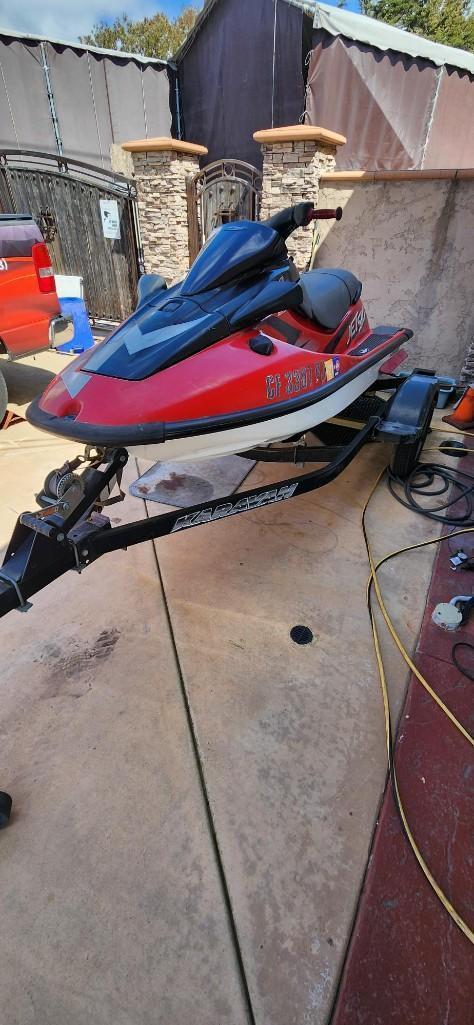 1997 1100 Kawasaki Jet Ski, Clean motor, but did not turn over./ 2010 Karavan trailer