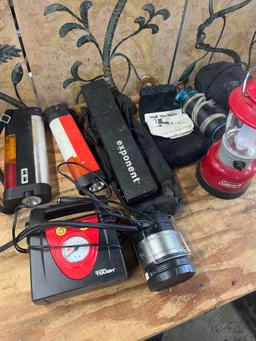 Assorted items. Lights, MSR water filter, inflator, etc. 7 pieces