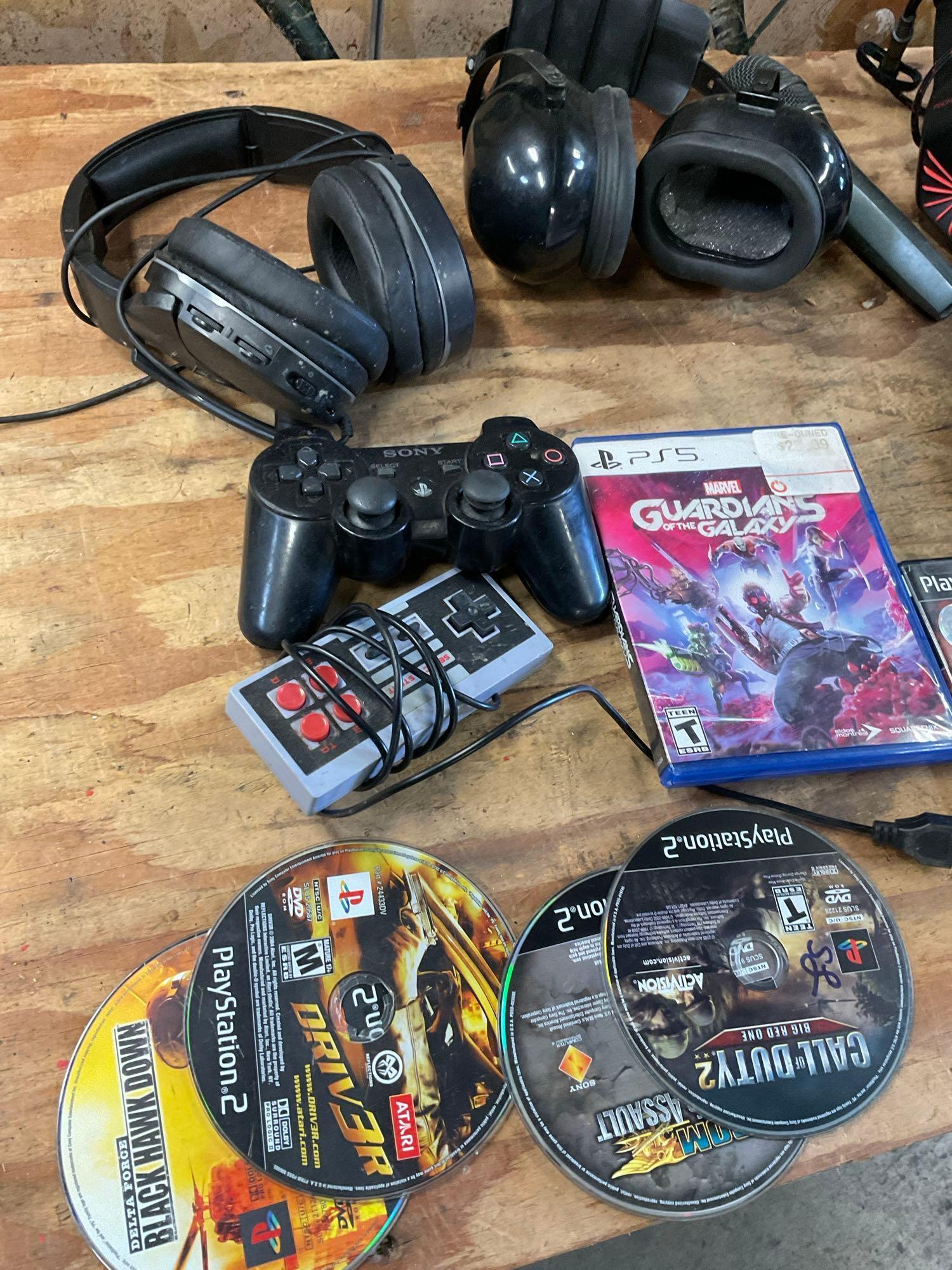 Assorted PlayStation games, headsets, controllers, microphone. 14 pieces