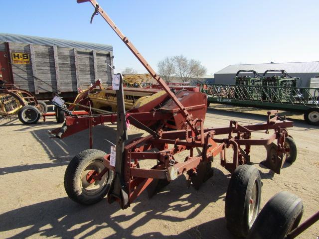 1582. 349-834. IH 4 X 16 TRIP BOTTOM PULL TYPE PLOW, COULTERS, TAX / SIGN S