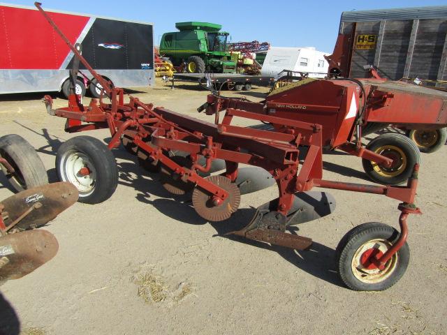 1582. 349-834. IH 4 X 16 TRIP BOTTOM PULL TYPE PLOW, COULTERS, TAX / SIGN S