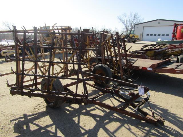 1586. 364-782. 4 SECTION SPIKE TOTH HARROW ON HARMS HYDRAULIC CART, TAX / S