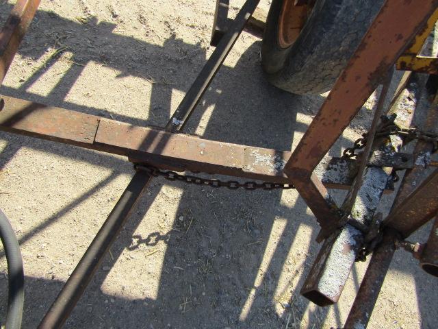 1586. 364-782. 4 SECTION SPIKE TOTH HARROW ON HARMS HYDRAULIC CART, TAX / S