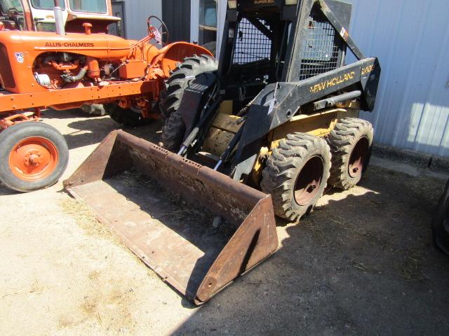 1610. 370-812. NEW HOLLAND LX 485 DIESEL SKID LOADER, AUX. HYD., 78 INCH BU