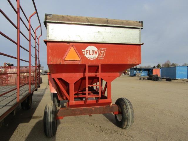 1774. 304-550. EZ FLOW GRAVITY BOX ON EZ TRAIL WAGON, TAX / SIGN ST3