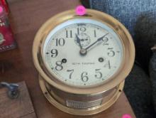 (LR) SETH THOMAS PLATED BRASS SHIPS BELL CLOCK. 7" DIA X 4"T.