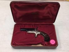 COLT'S P.F.A. MFG. CO. .22 CALIBER SHORT DERRINGER PISTOL - SERIAL #21871D. COMES WITH DISPLAY BOX.