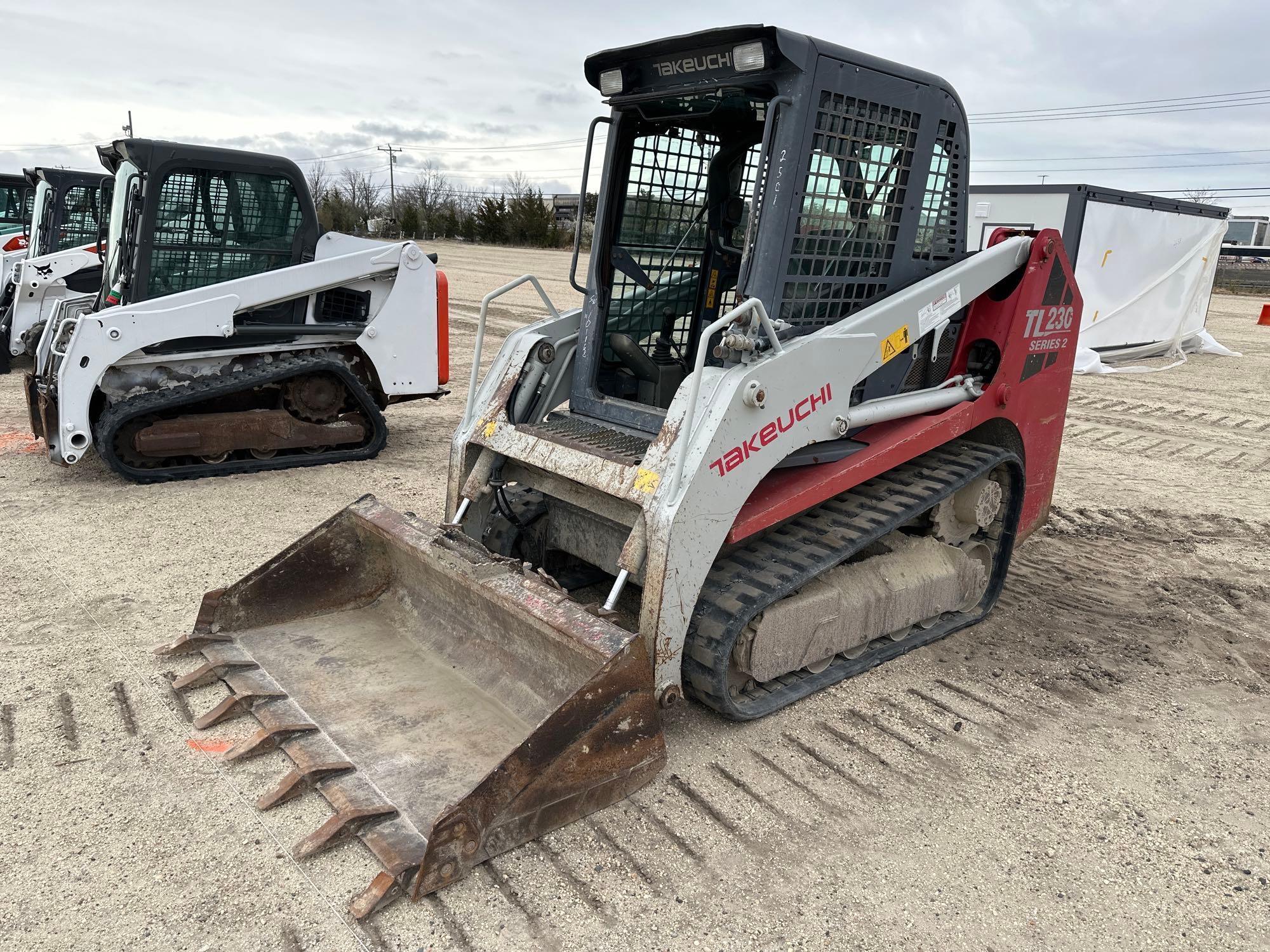 2012 TAKEUCHI TL230 SERIES II RUBBER TRACKED SKID STEER SN:223101168... powered by diesel engine,