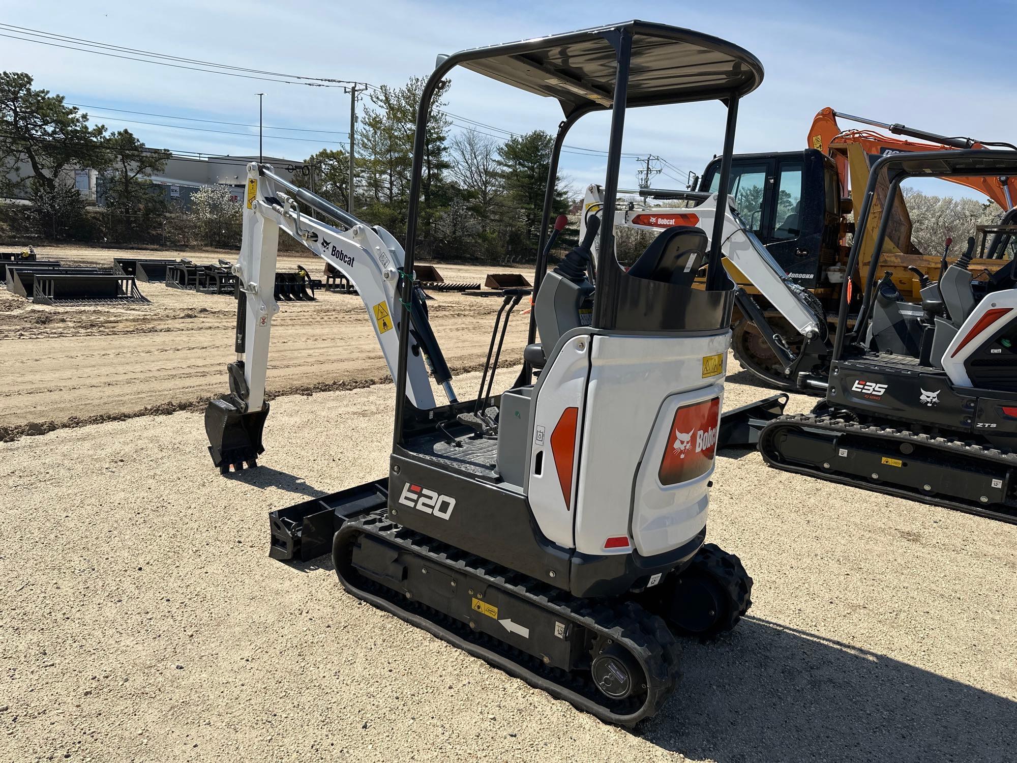 2023 BOBCAT E20 HYDRAULIC EXCAVATOR powered by diesel engine, equipped with OROPS, front blade,