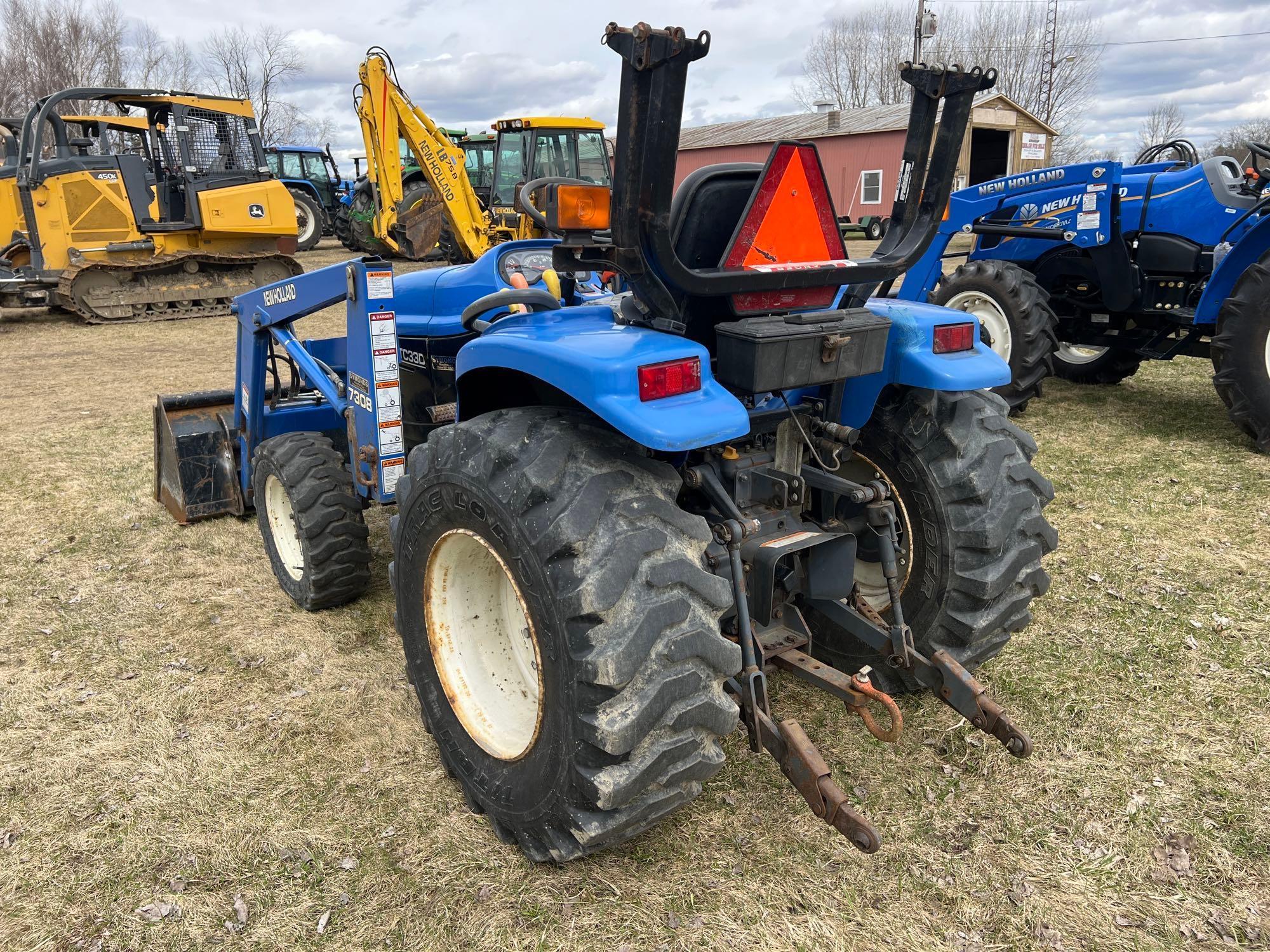 NEW HOLLAND TC33D TRACTOR LOADER 4x4 SN:6558, powered by diesel engine, equipped with ROPS, GP front