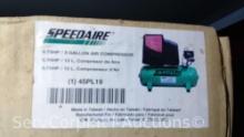 Lot on Shelf of Speedaire 3-Gallon Electric Air Compressor- New in Box, Packaging Damaged