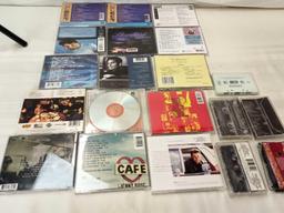 ASSORTED CDS AND CASSETTES COUNTRY, ROCK AND OLDIES. VINCE GILL, RED HOT CHILLI PEPPERS, OTHERS.