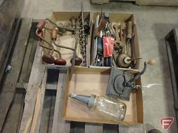 Brace drills, old wrenches, oiler, file, ball oil jar, and grinder