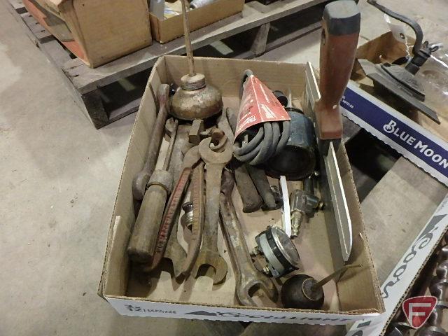 Brace drills, old wrenches, oiler, file, ball oil jar, and grinder