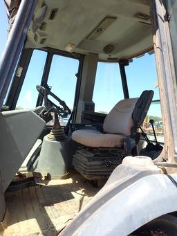 CASE 580 SUPER L BACKHOE, 8811+ hrs,  CAB, AC, HYDRAULIC 3 IN 1 BUCKET, EXT