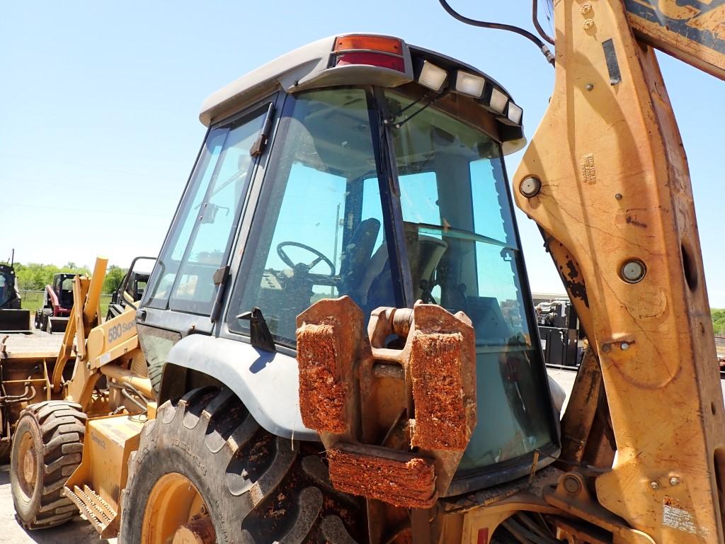 CASE 580 SUPER L BACKHOE, 8811+ hrs,  CAB, AC, HYDRAULIC 3 IN 1 BUCKET, EXT