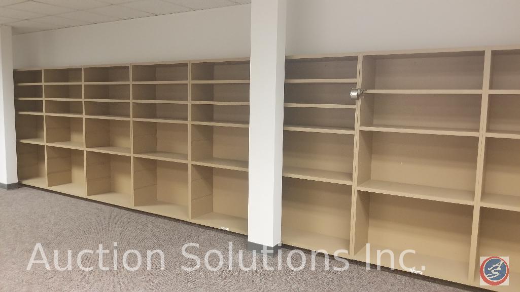 11 sections of 4 foot shelving, two cubicles manufactured by ZAPF office furniture. 3 office chairs,