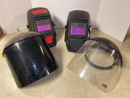 Four Welding Helmets and Face Masks