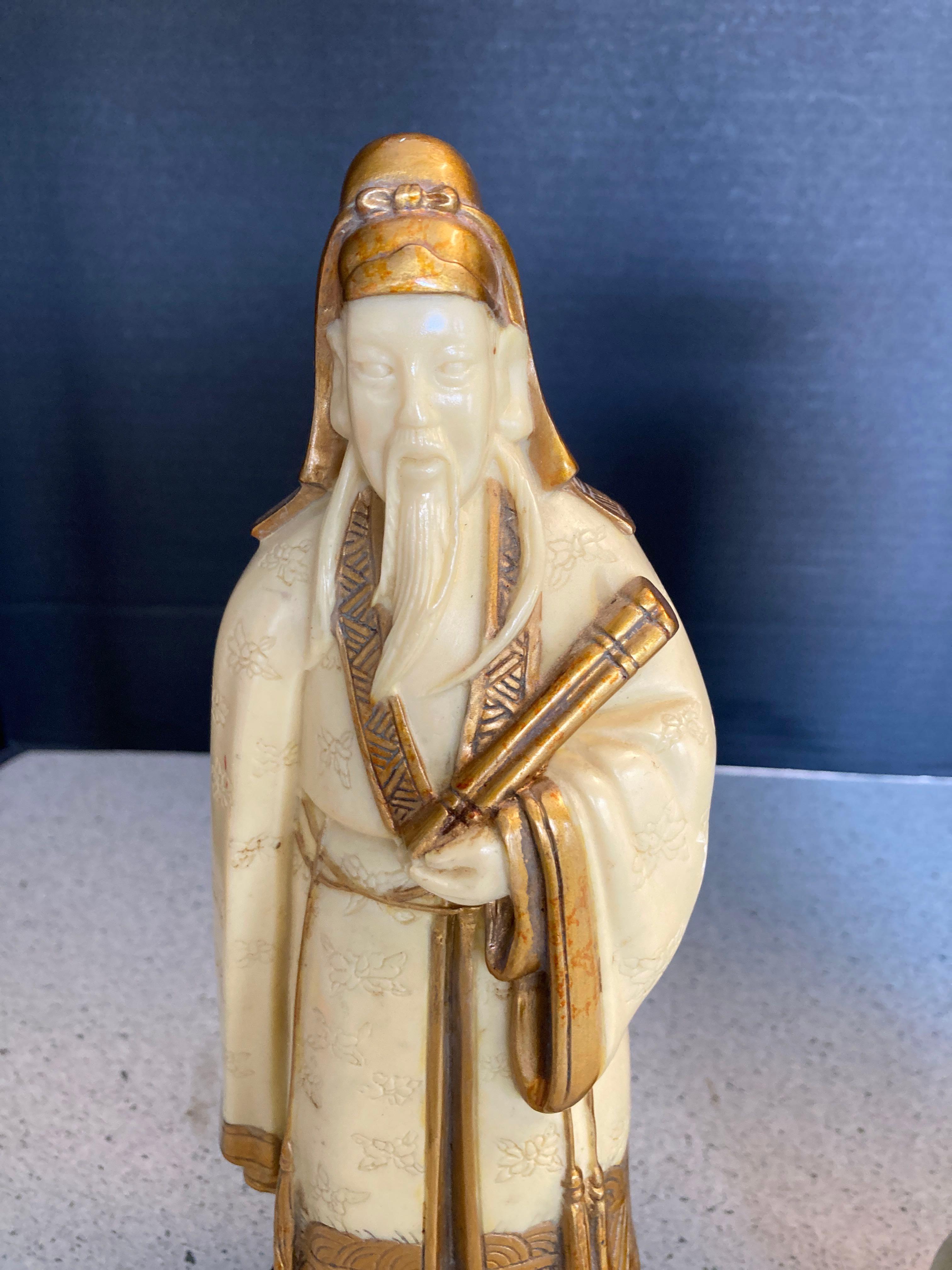 2 asian wise man figurines