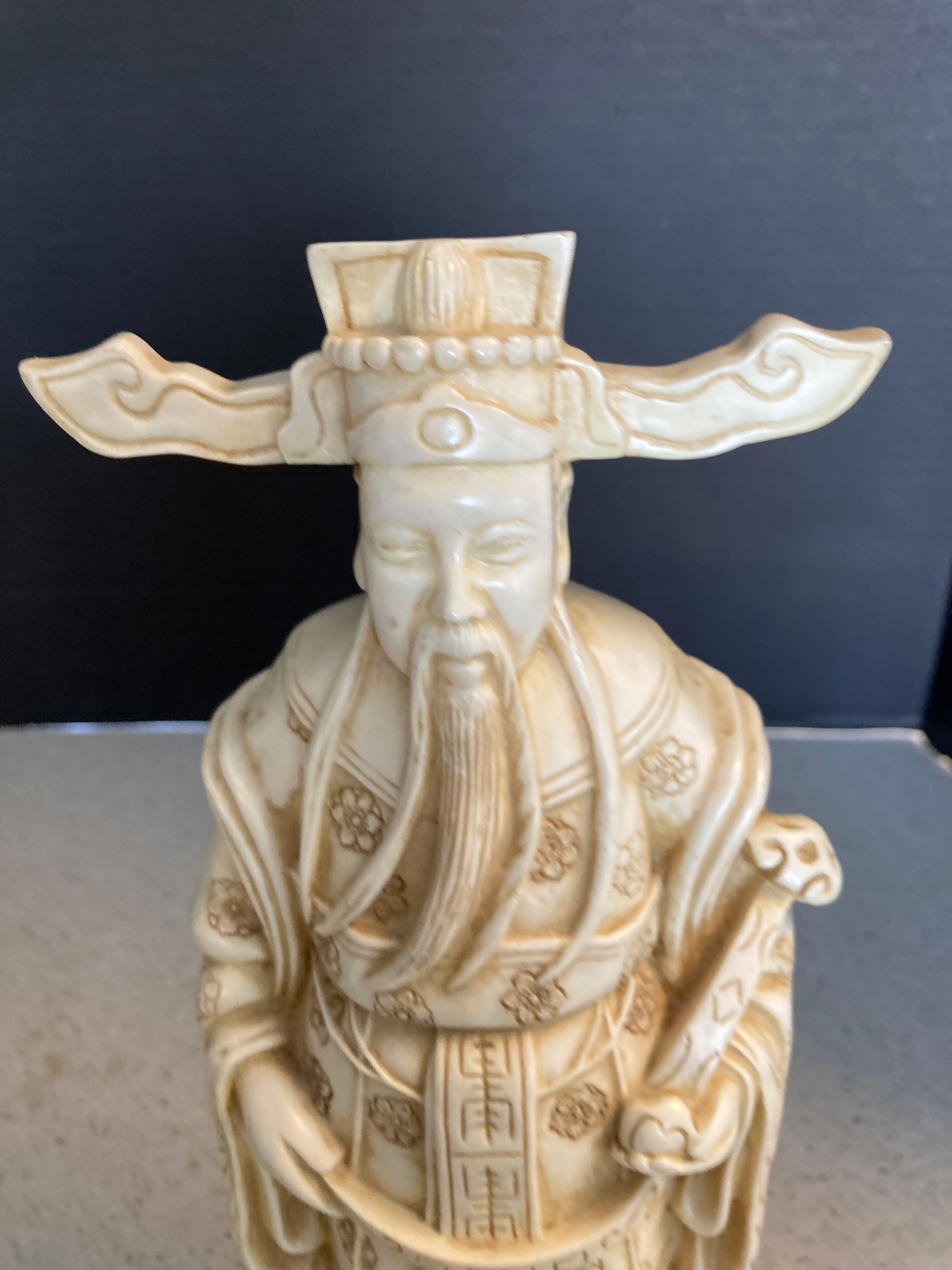 2 asian wise man figurines