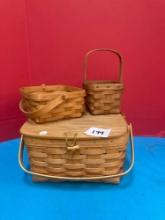 Three Longaberger baskets