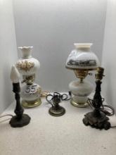 Two parlor lamps, one Currier and Ives, and three metal lamps