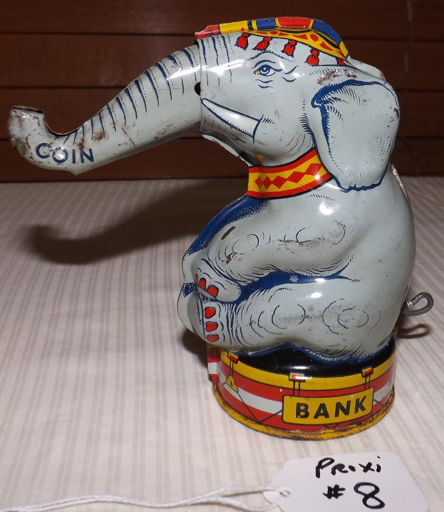 Chein Circus Elephant Tin Coin Bank, Mechanical Pull Tail, 1940s Circa, 5" Tall.