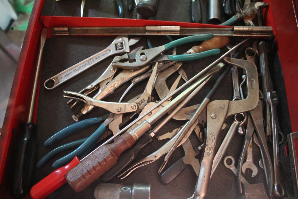 Contents Of Drawer Including Assorted Pliers, Wrenches, Screwdrivers