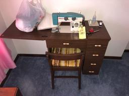 White Console Sewing Machine With Contents