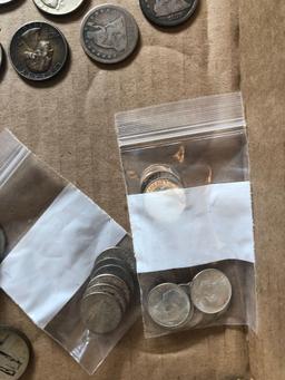 30+ Silver Quarters and 9 silver dimes.