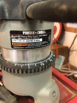Porter cable model 691 router with wood box.