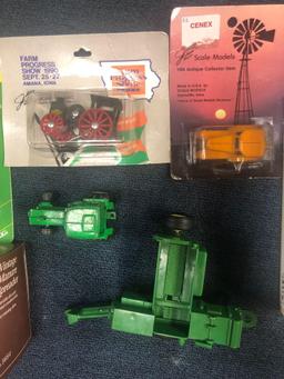 John Deere and Farm Progress show diecast tractors in packages 2 with no package