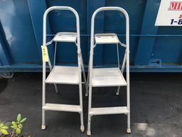 Two aluminum stepladders