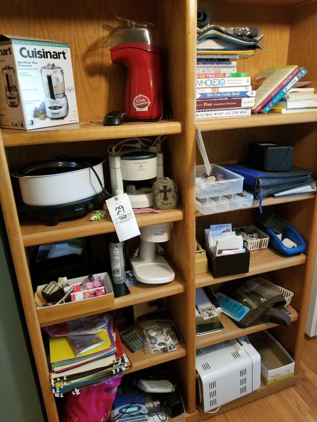 Contents of shelf incl. appliances, books, calculators